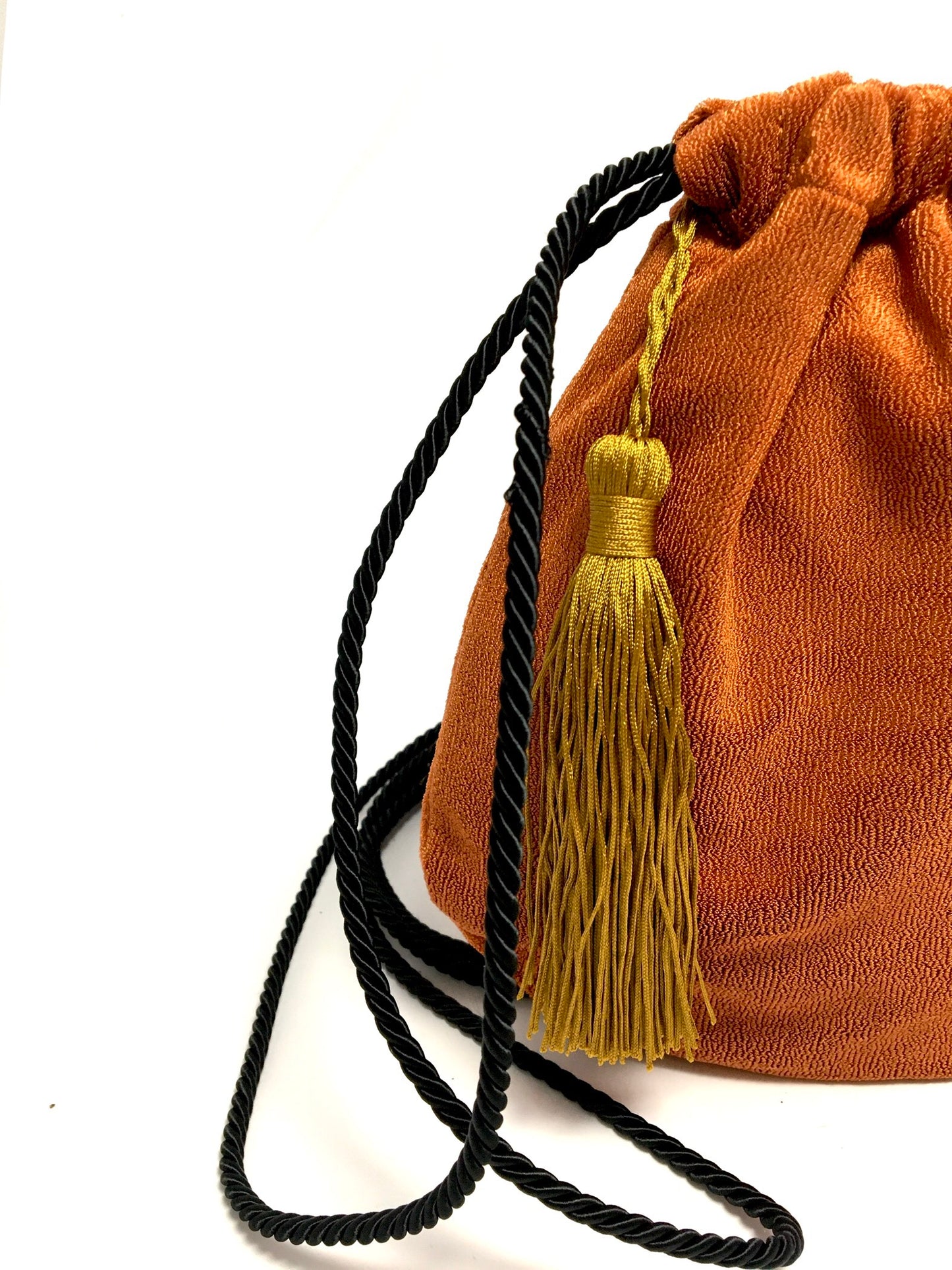 Copper recycled bag with tassel