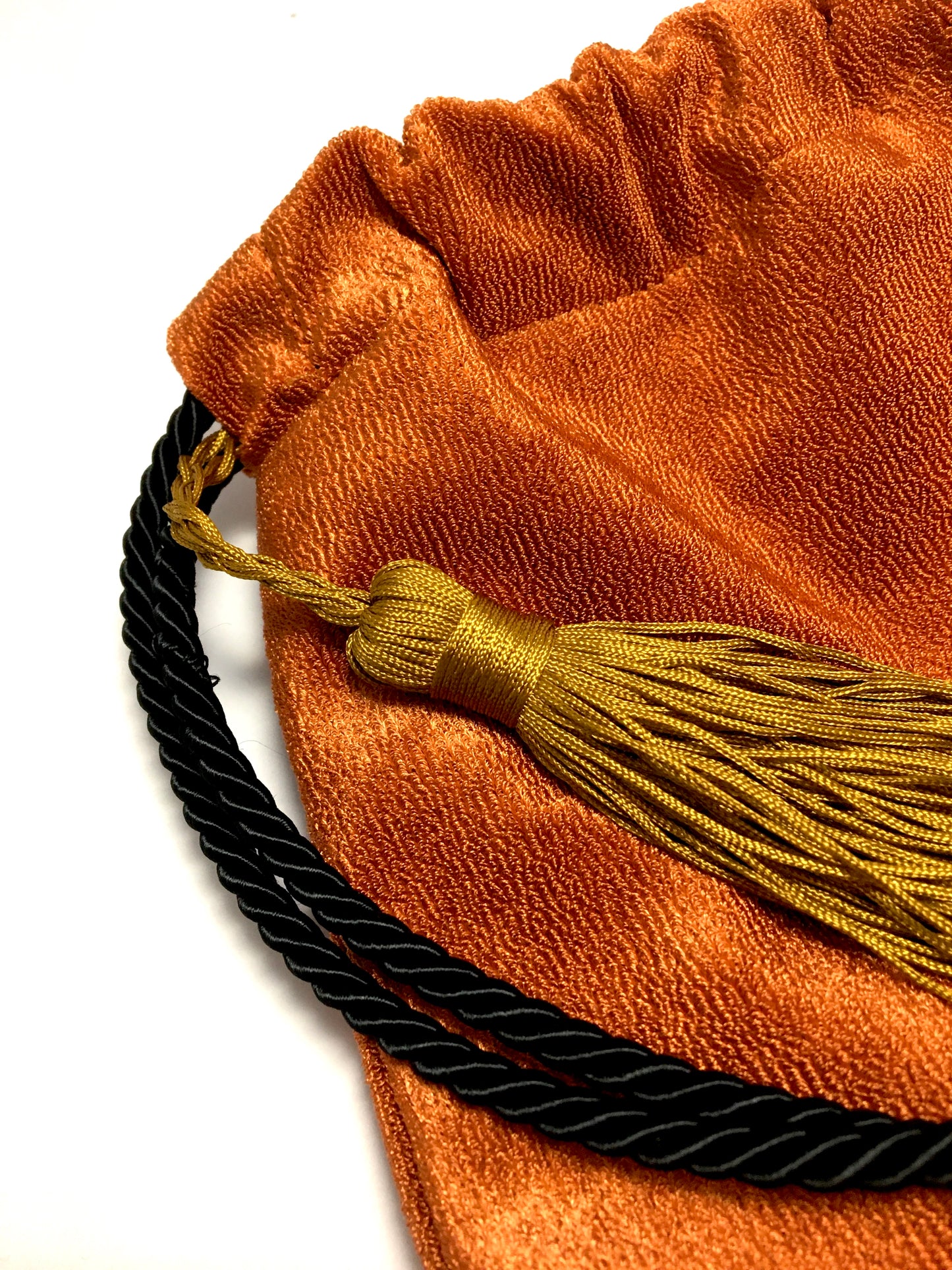 Copper recycled bag with tassel