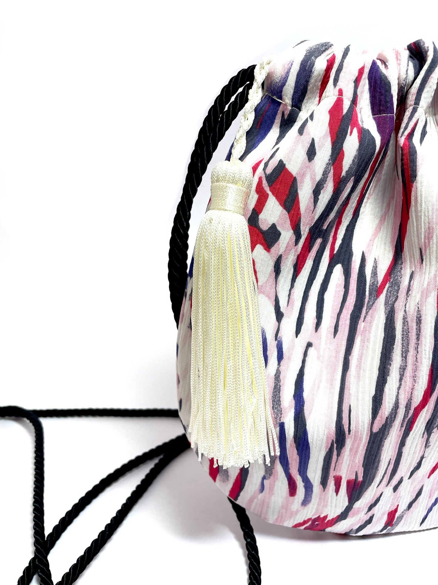 Colorful bucket bag with a tassel