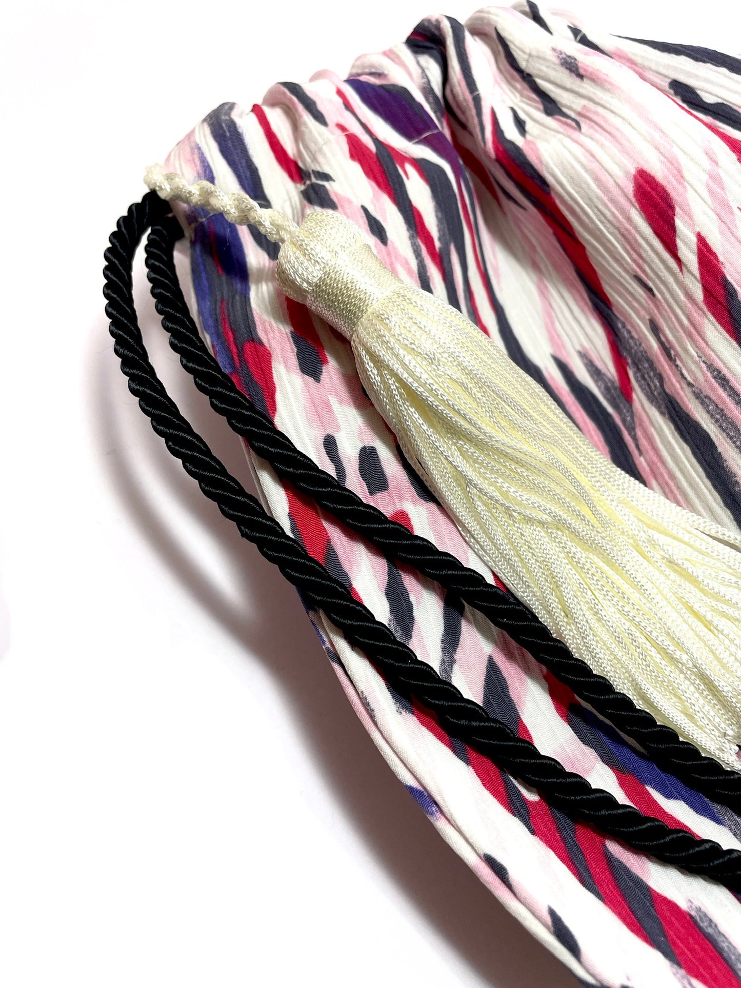 Colorful bucket bag with a tassel