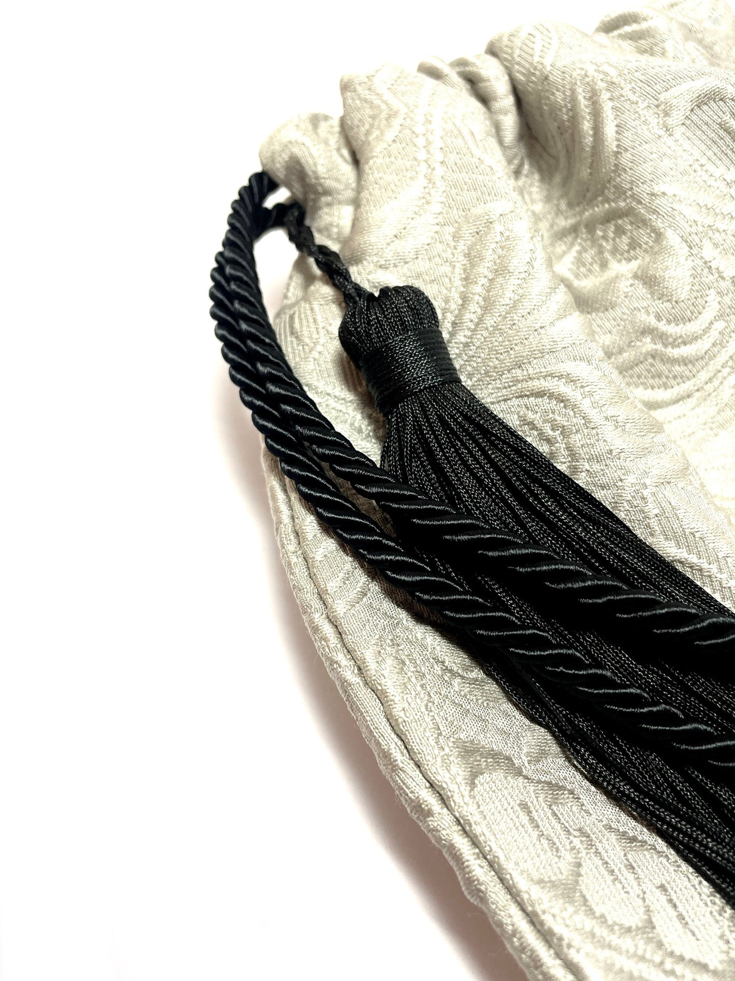 Patterned silver bucket bag