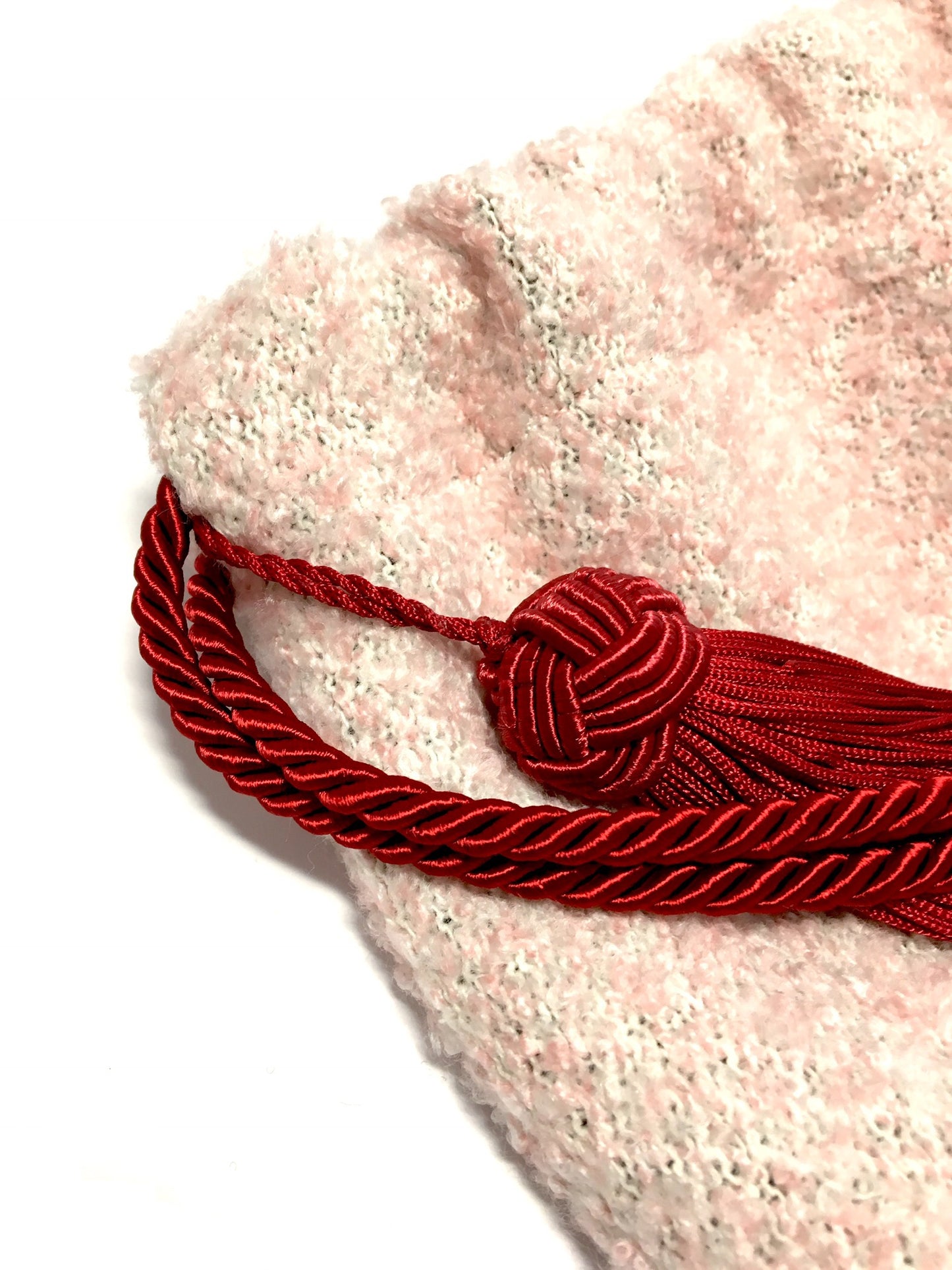 Pink woolen purse with tassel