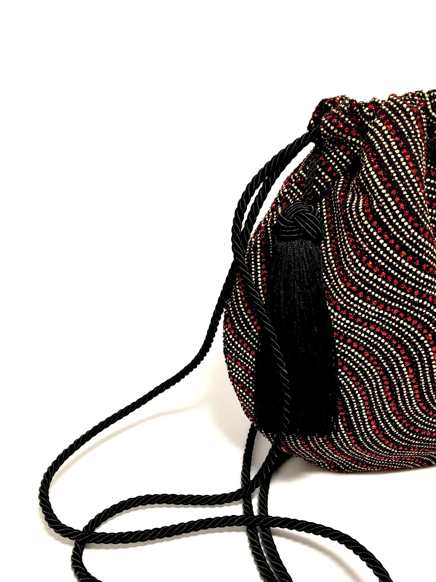 Shiny evening bag with tassel