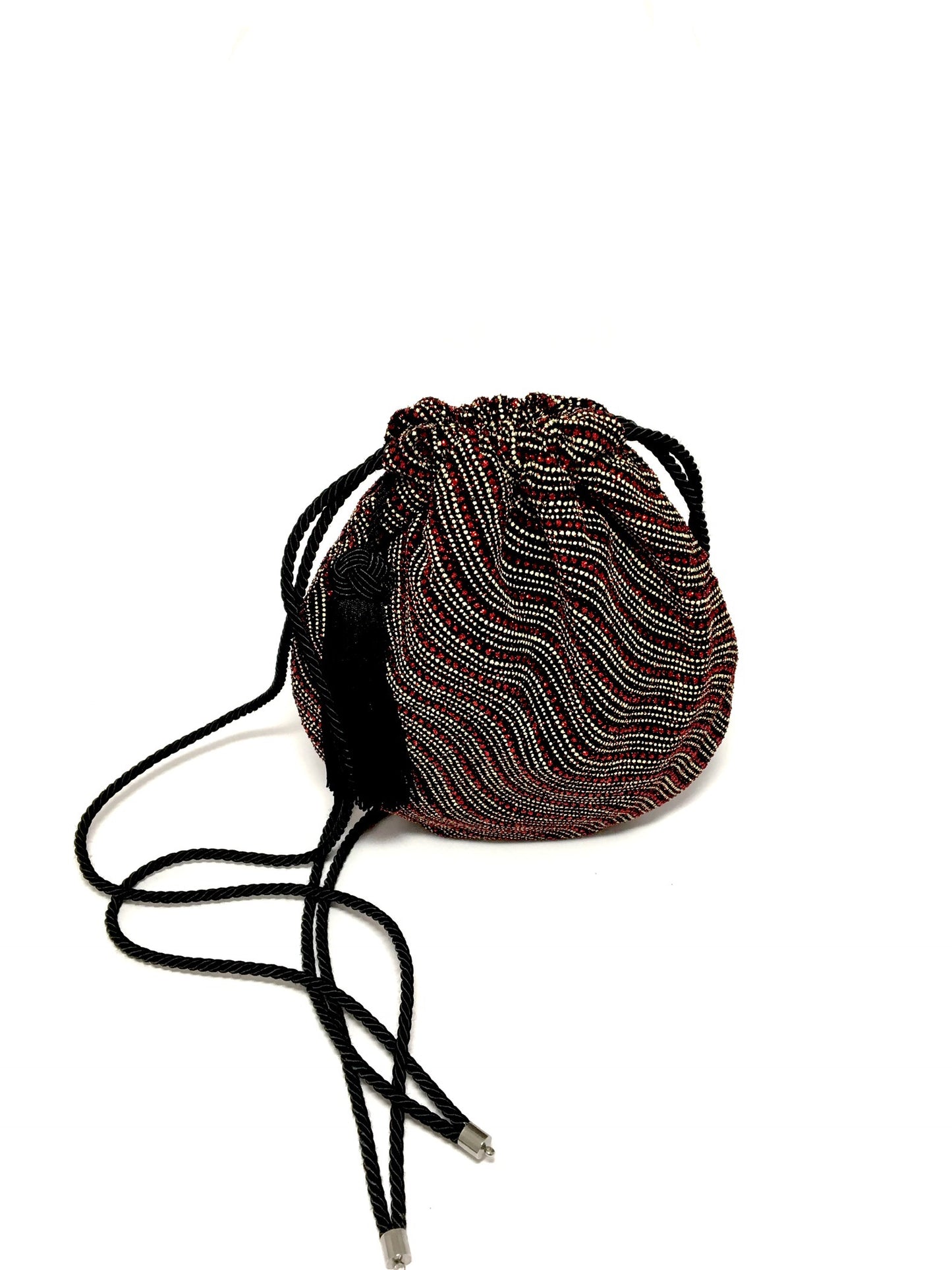 Shiny evening bag with tassel