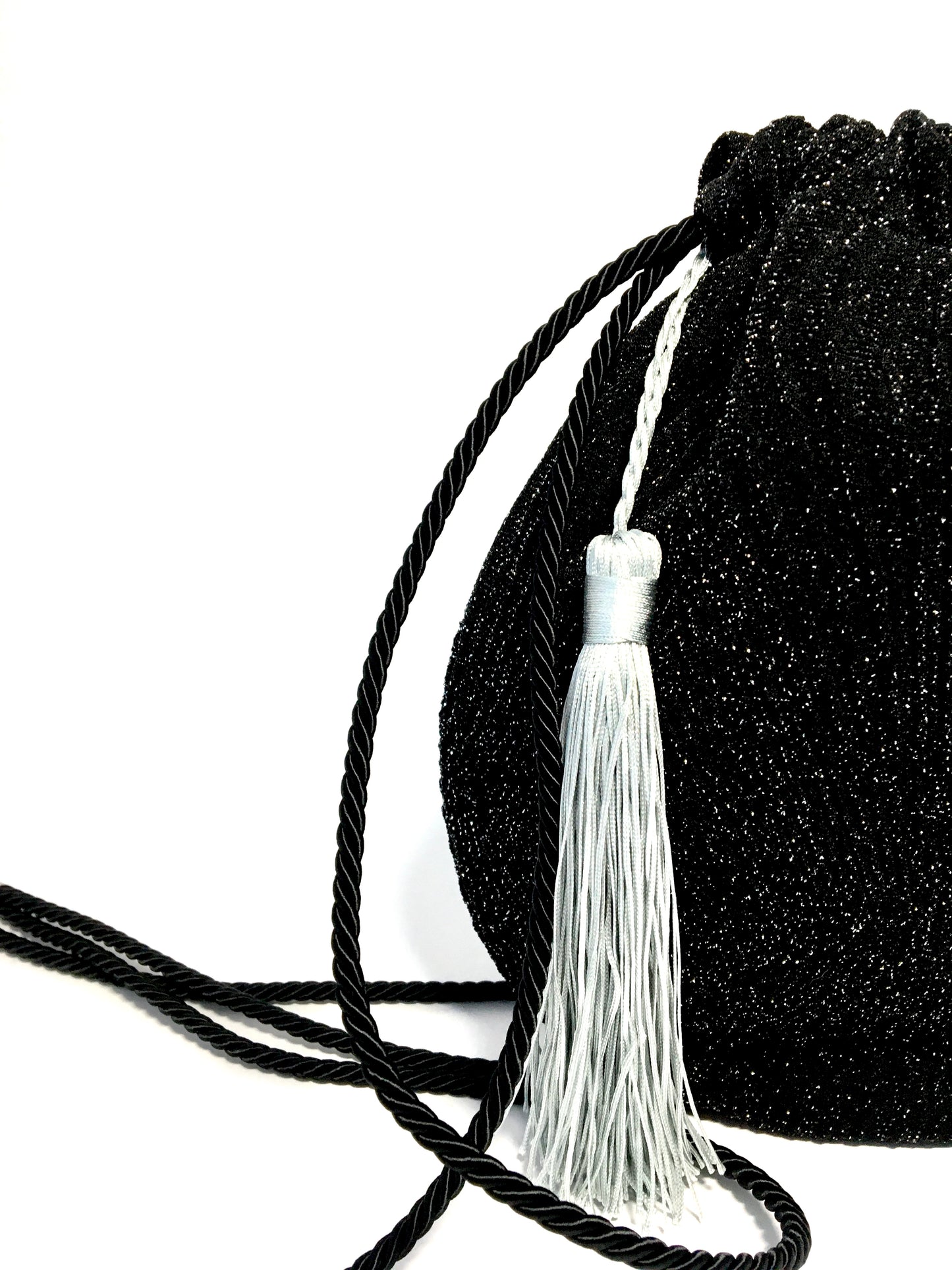 Black shiny bag with tassel
