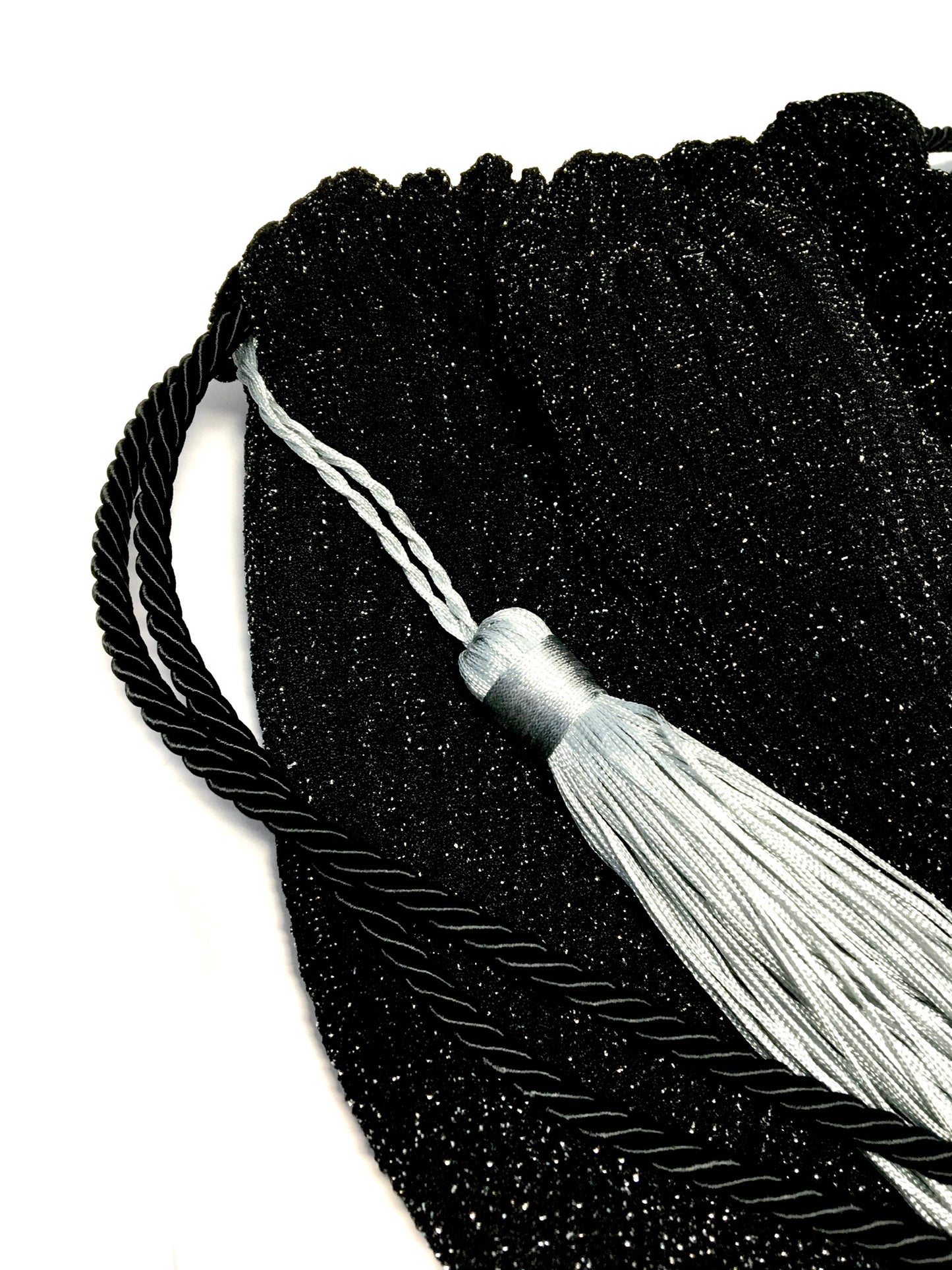 Black shiny bag with tassel