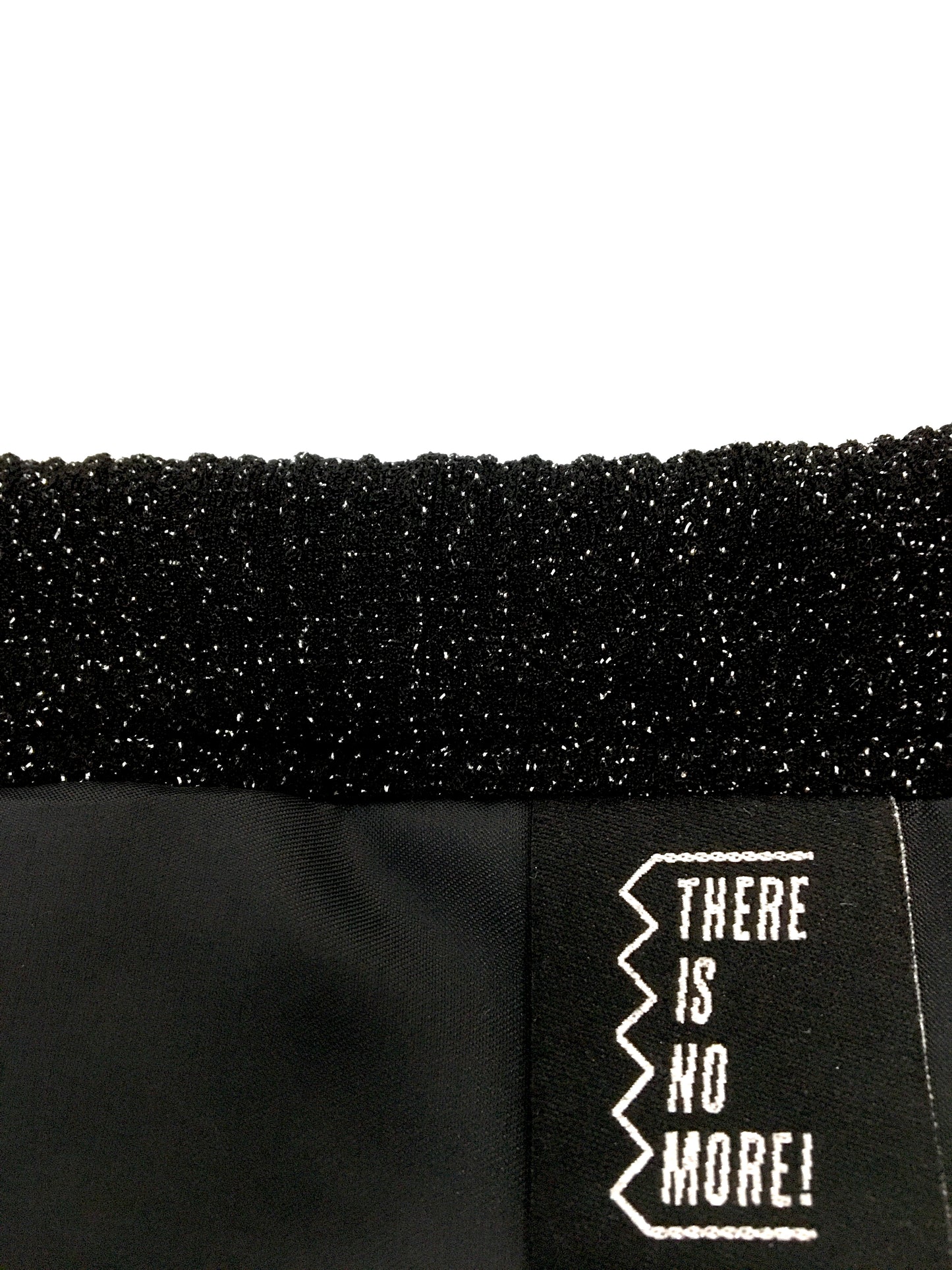 Black shiny bag with tassel