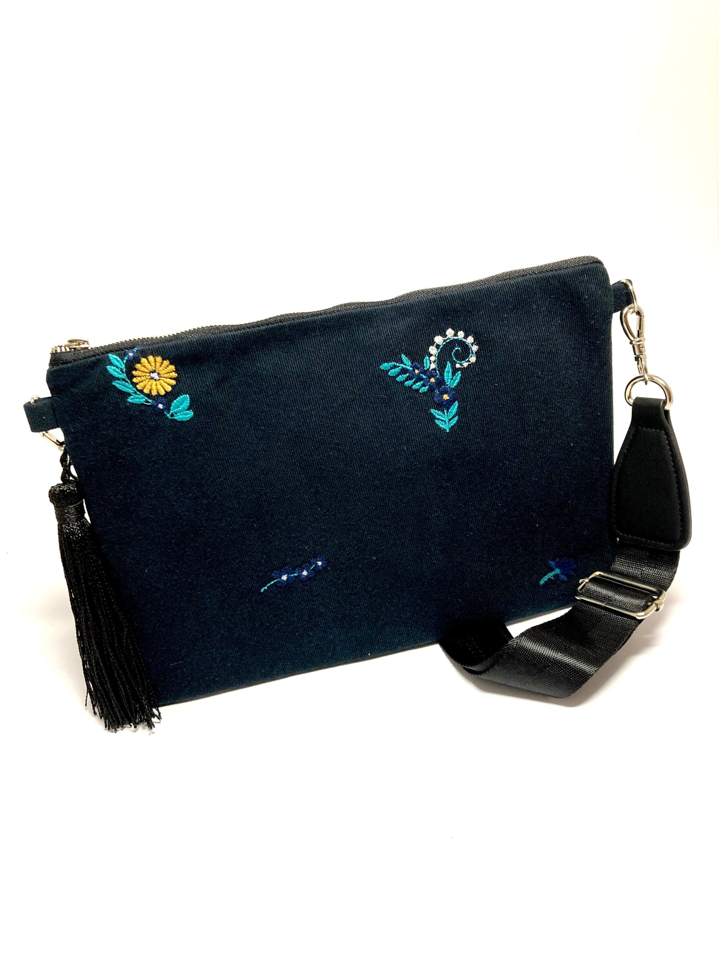 Blue embroidered bag with tassel