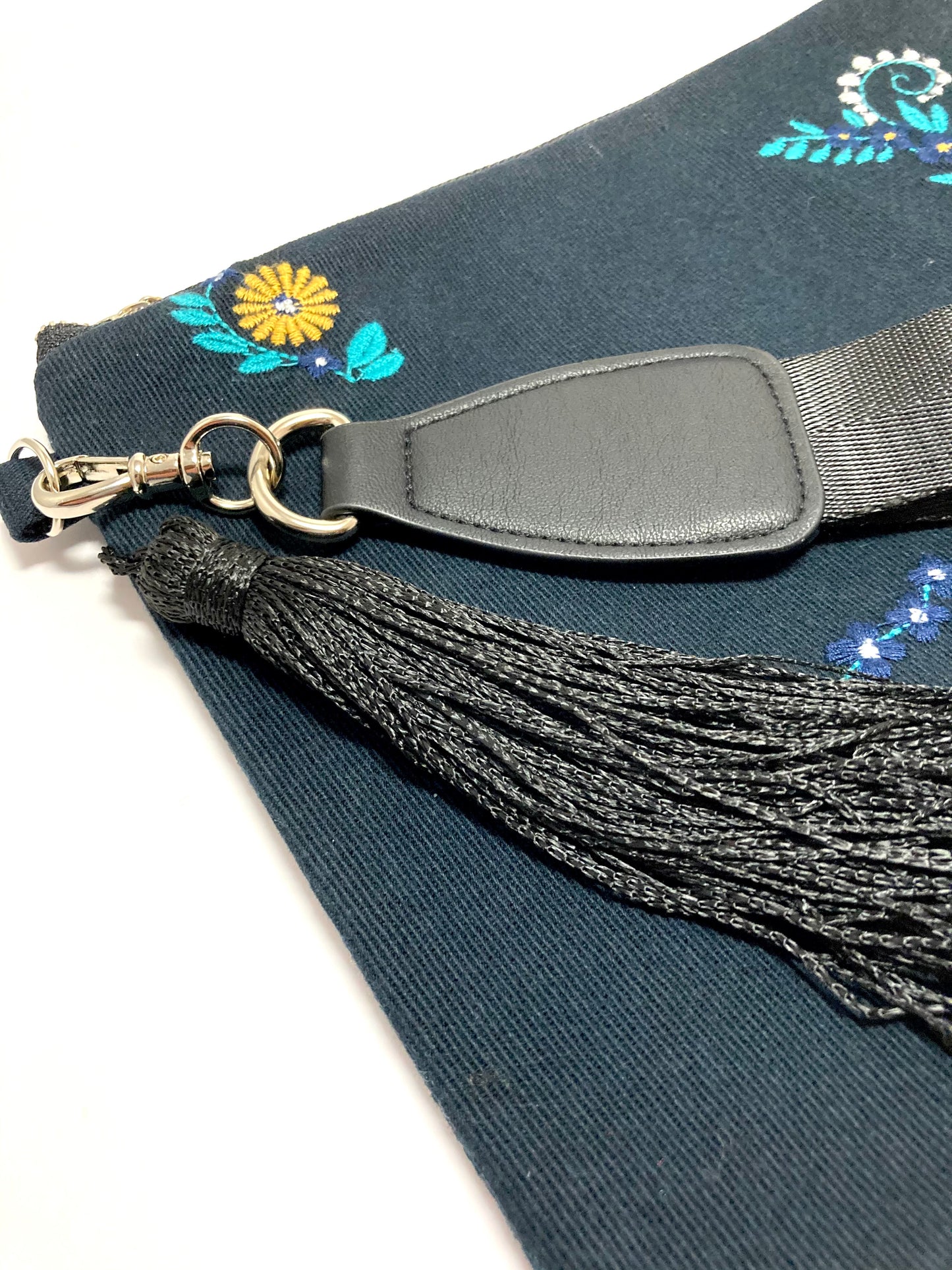 Blue embroidered bag with tassel