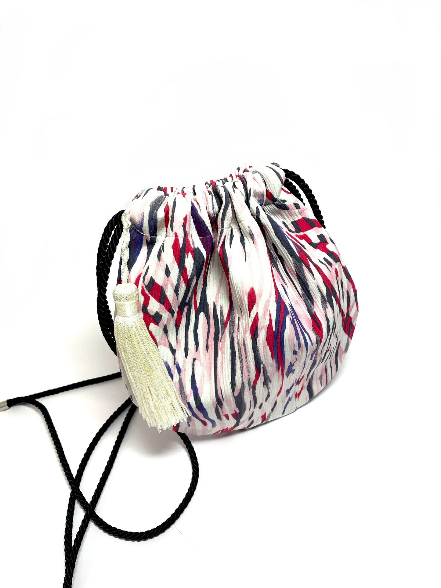 Colorful bucket bag with a tassel
