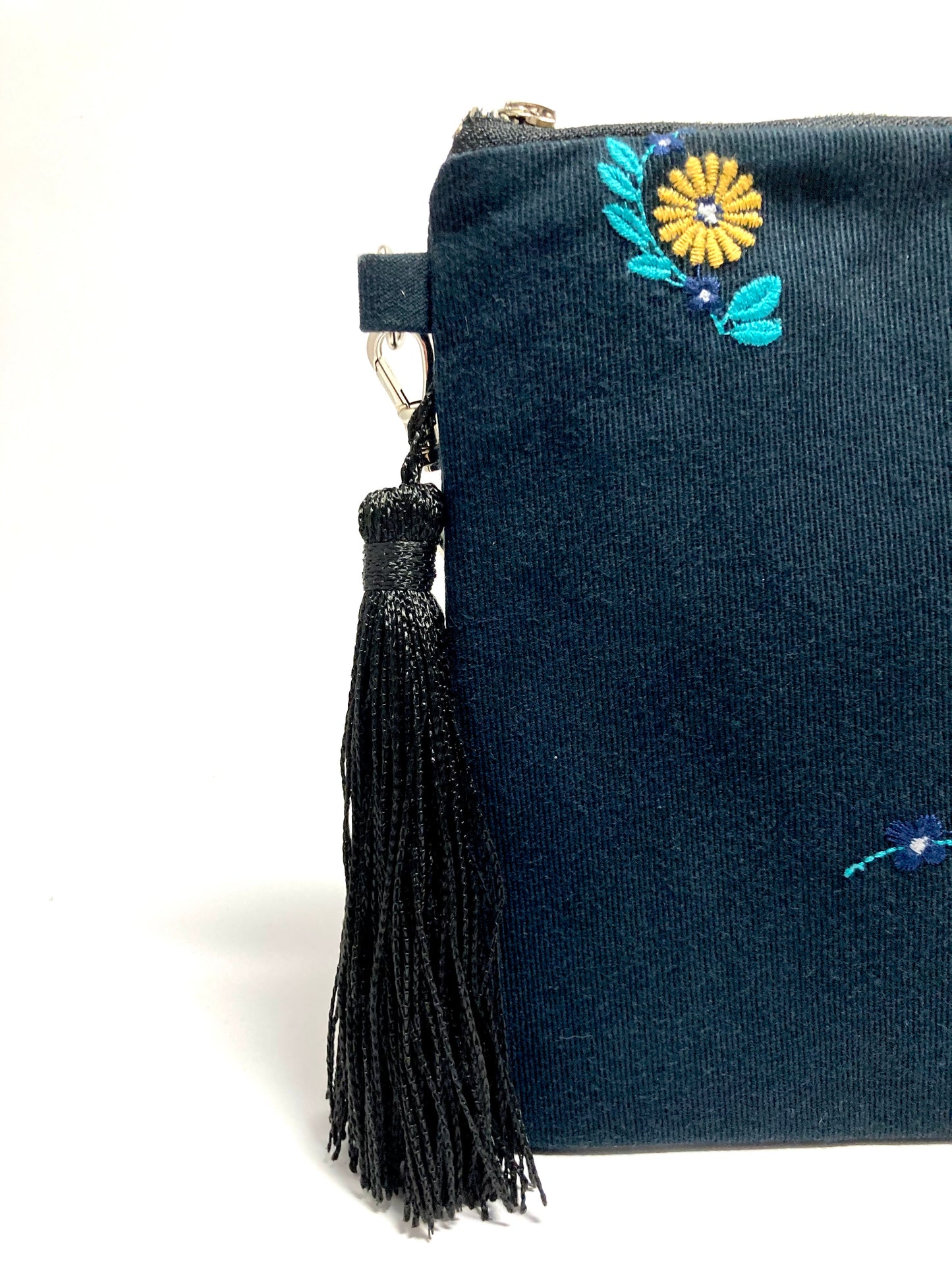 Blue embroidered bag with tassel