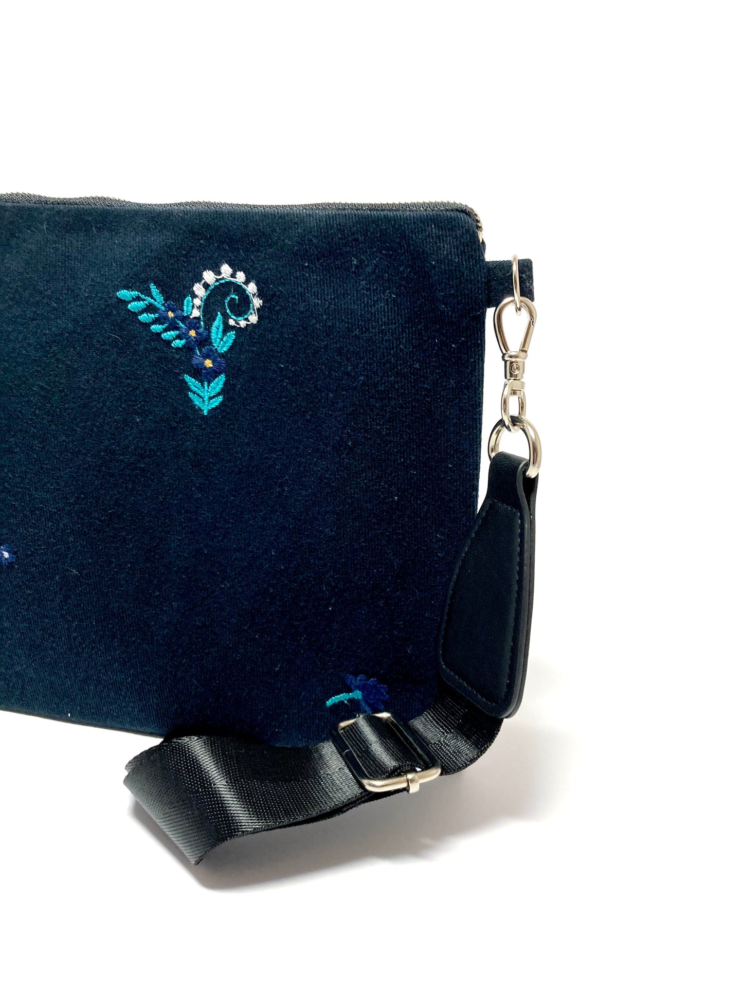 Blue embroidered bag with tassel